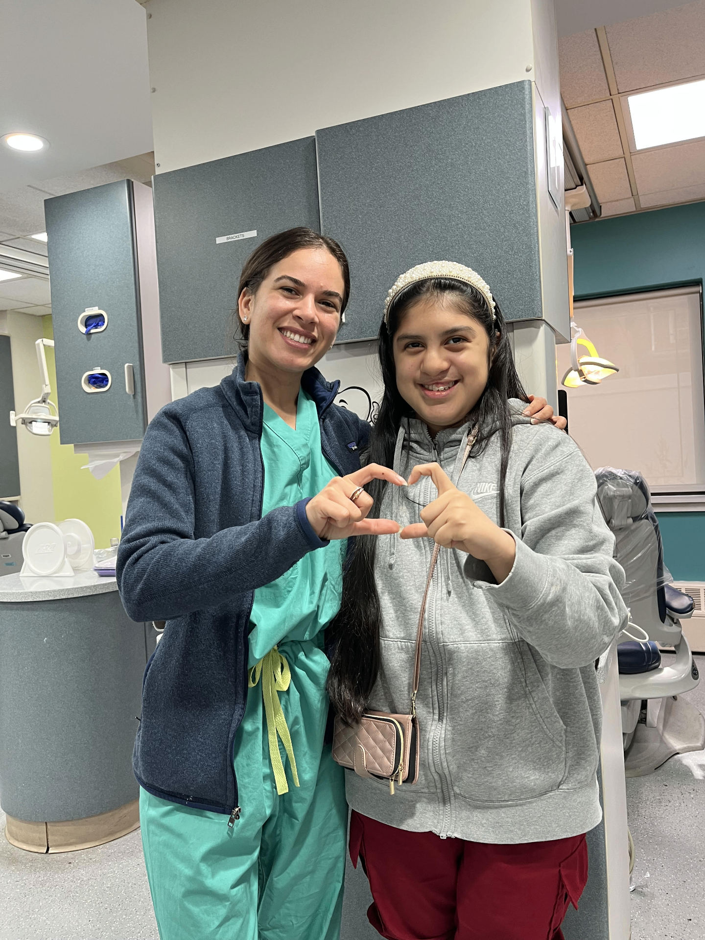 Dr. Kahen with a patient