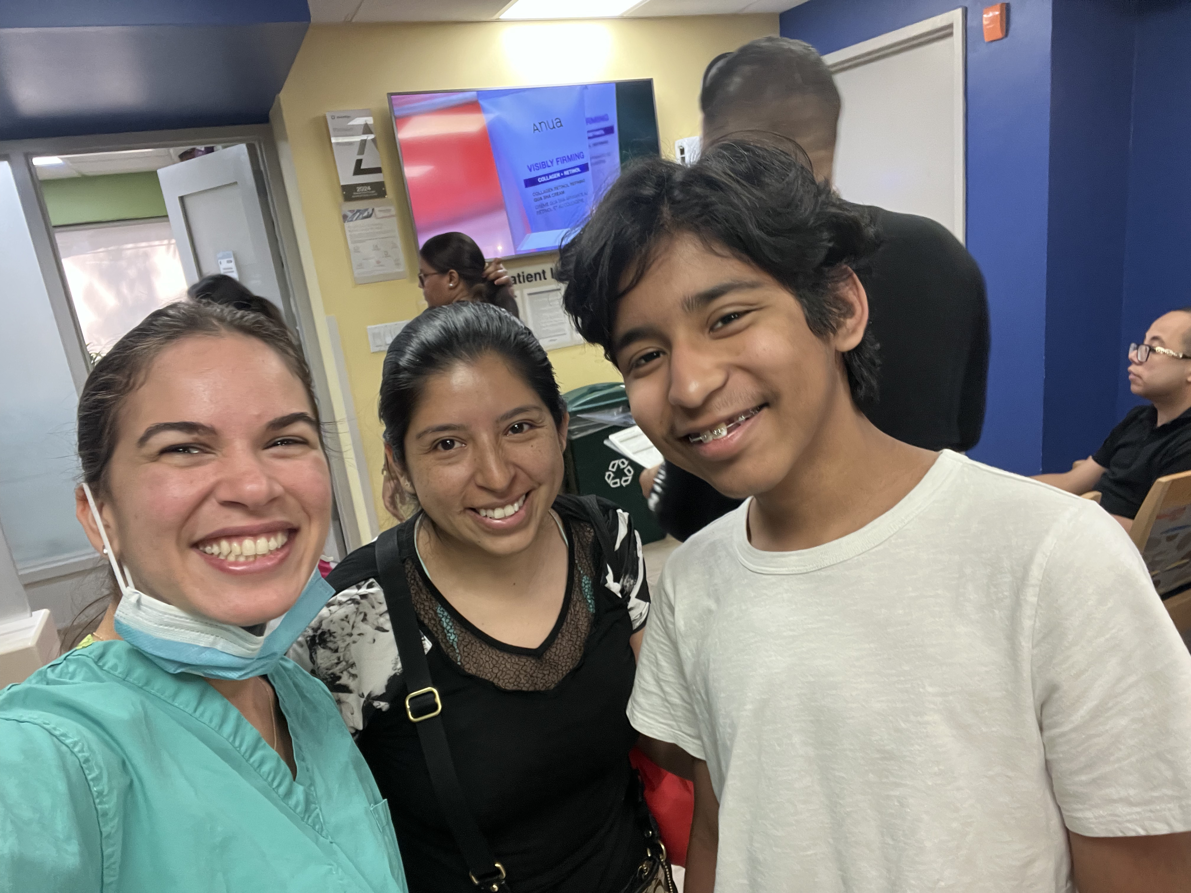 Dr. Kahen with a patient